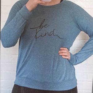 Super soft and blue “be kind” scoop neck sweater.